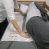 easy slide disposable in use handicare 1 600x600