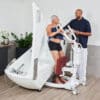 beka nora pro sit to stand sitting patient on chair and caregiver motion bathtub