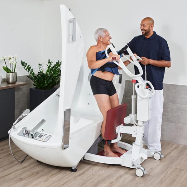 beka nora pro sit to stand sitting patient on chair and caregiver motion bathtub