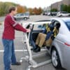 medcare car extractor in use caregiver handicare